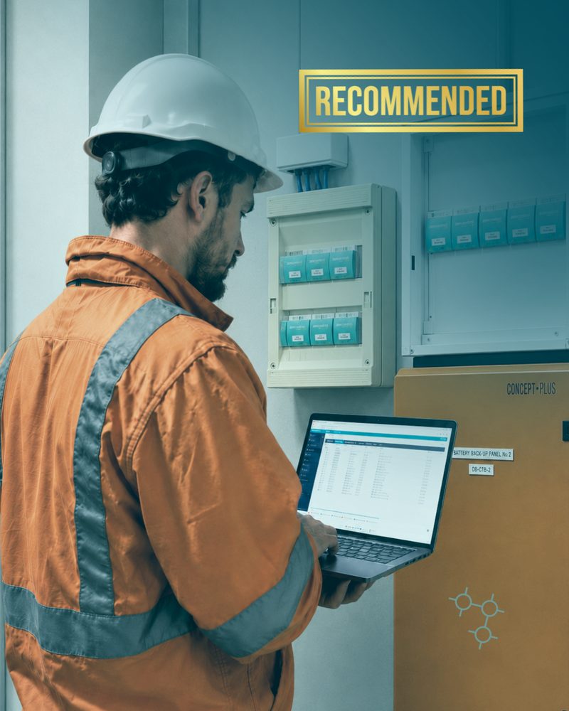 Technician reviewing zencontrol on a laptop beside a switchboard, Bronze Course recommended
