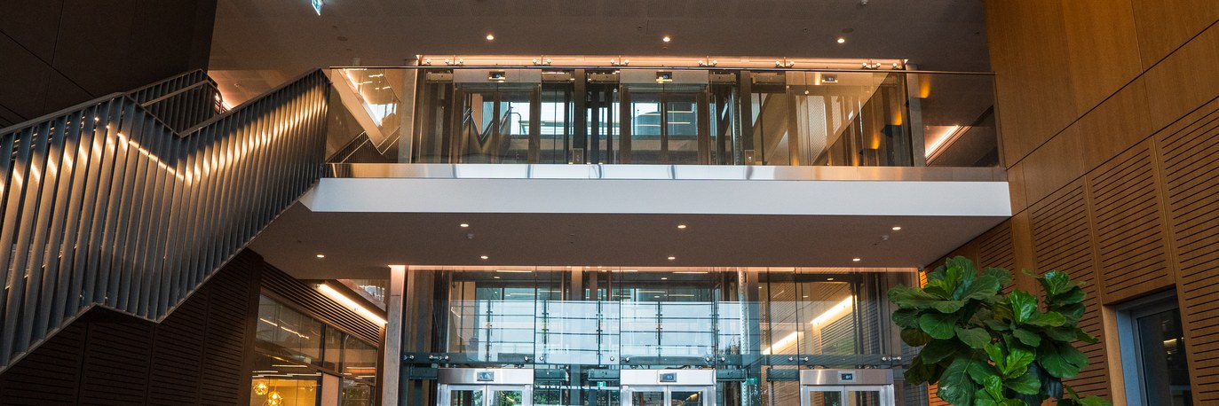 Lit stair and glazed lobby of a DALI-2 controlled commercial building